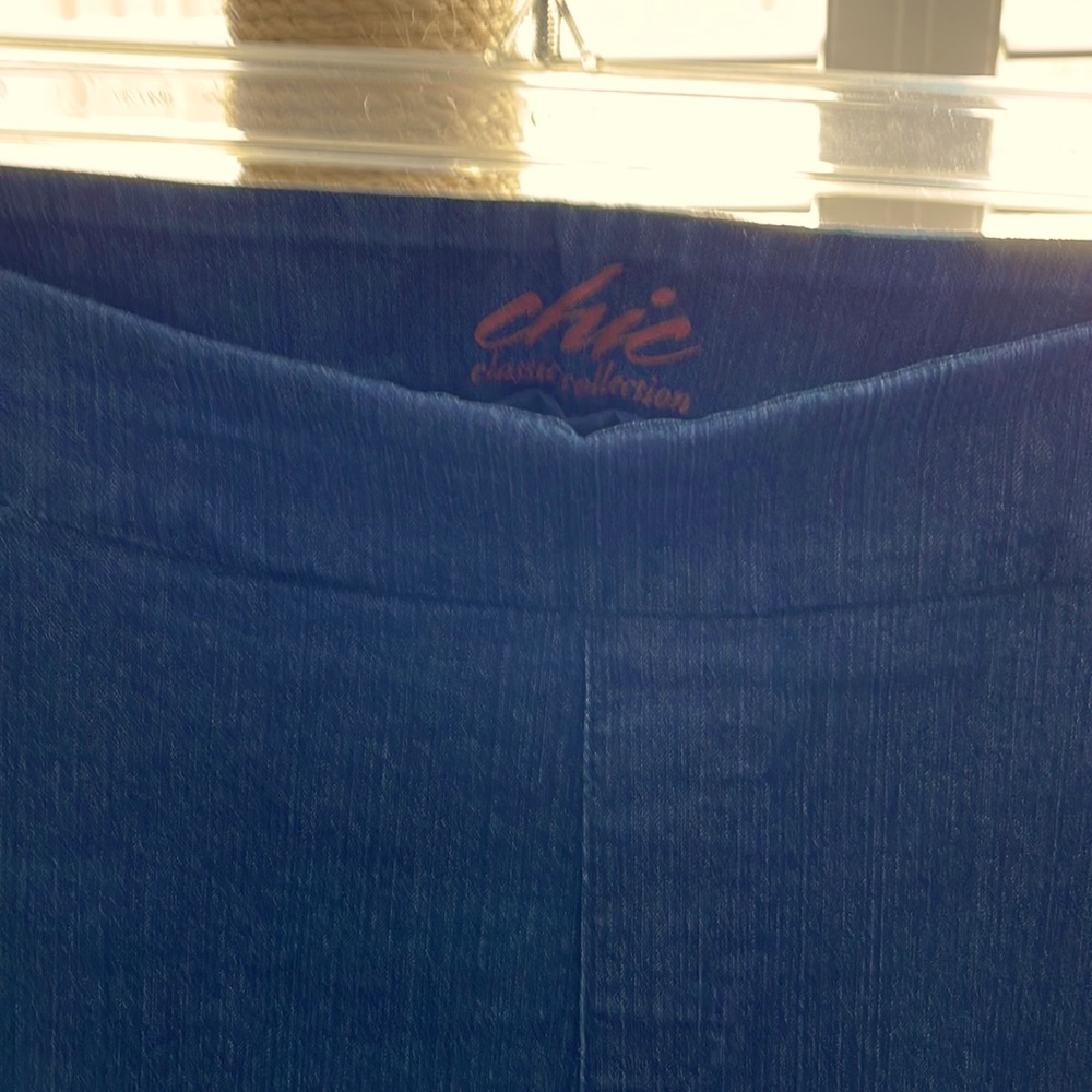 Women’s denim pull-on jeans with pockets in front and back.